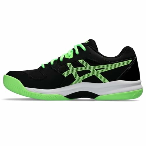 Black and green tennis shoe with white sole