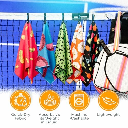 Colorful sports towels hanging on a tennis net with quick-dry, absorbent, machine washable, lightweight features.