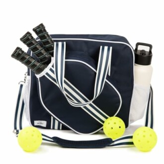 Pickleball bag with rackets, balls, and water bottle.