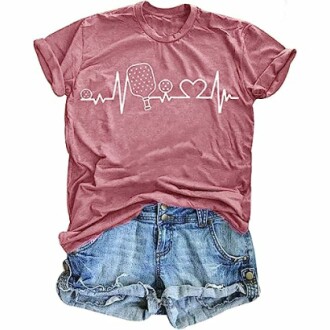 Red t-shirt with ping pong heartbeat design and denim shorts.