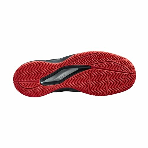 Red tread pattern on sneaker sole