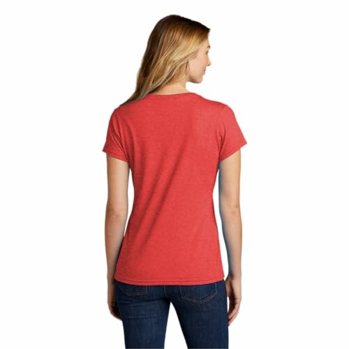 Woman wearing a red t-shirt, back view